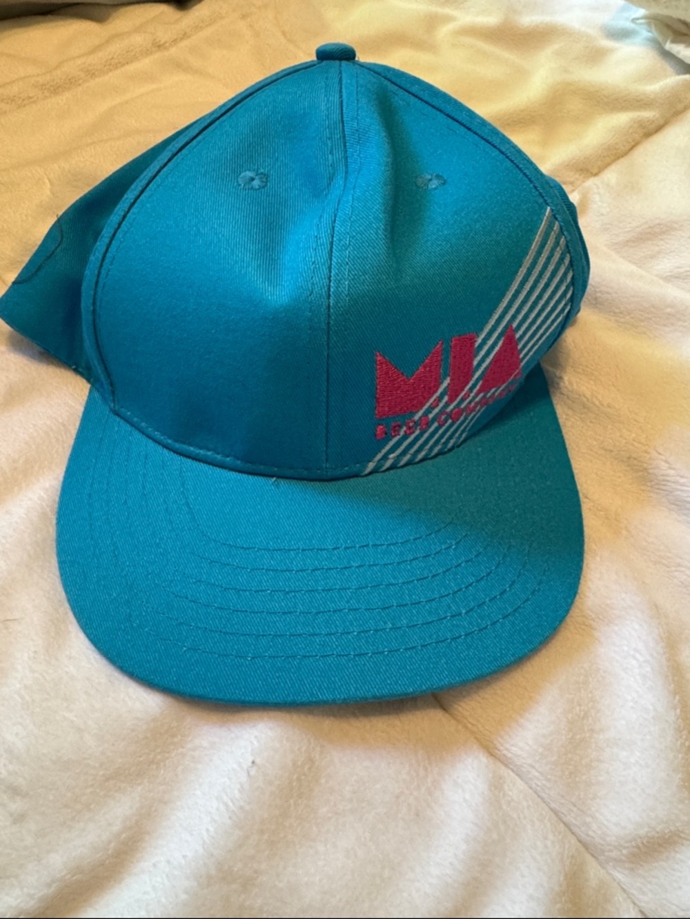 New Teal Snapback Cap with Pink 'MIA beer company” Logo